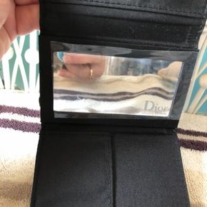 Dior compact and Vera Bradley bag original owner